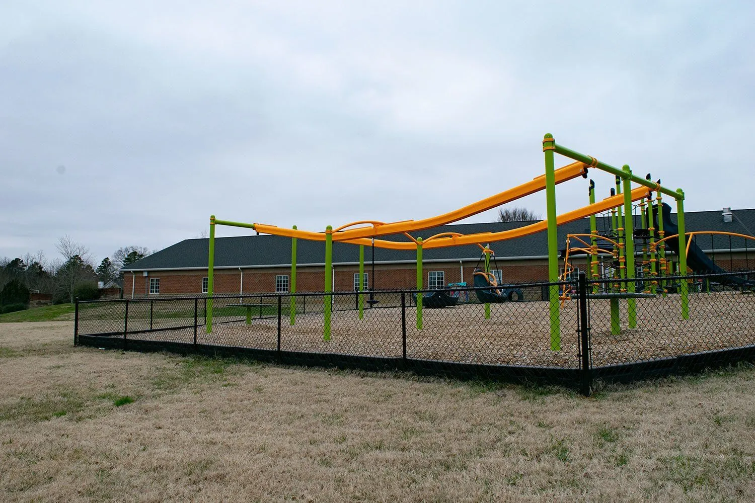 Commercial chain link fence installed at school playground by commercial fence company, lc fence in knoxville